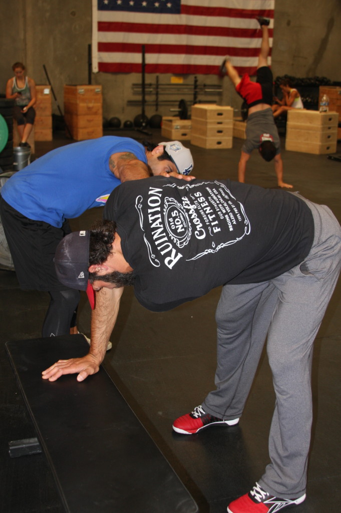 Amir stretching Coach Paul!